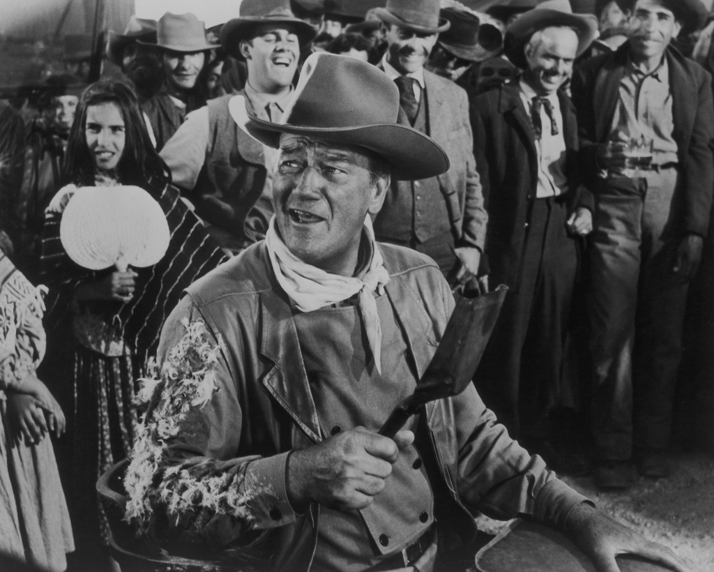 American actor John Wayne (1907 - 1979) plays the lead character in the film 'McLintock!', 1963. 