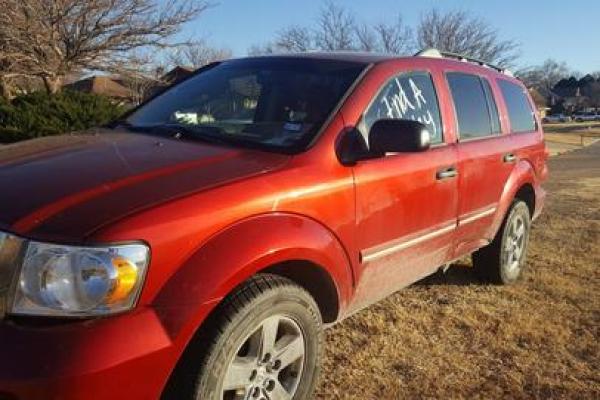 Authorities located Tom Brown's red Dodge SUV on a small hill. One window was rolled down, the car was unlocked, and Tom's personal belongings including wallet, keys, cell phone and laptop were missing. 