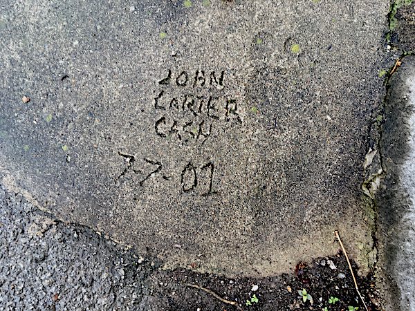 As you walk up the driveway, you're greeted by notes in the sidewalk cement from the Cash family. 
