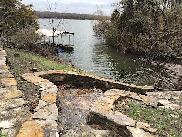 The rock pathway down to the Cash's boat dock is still mostly intact. 