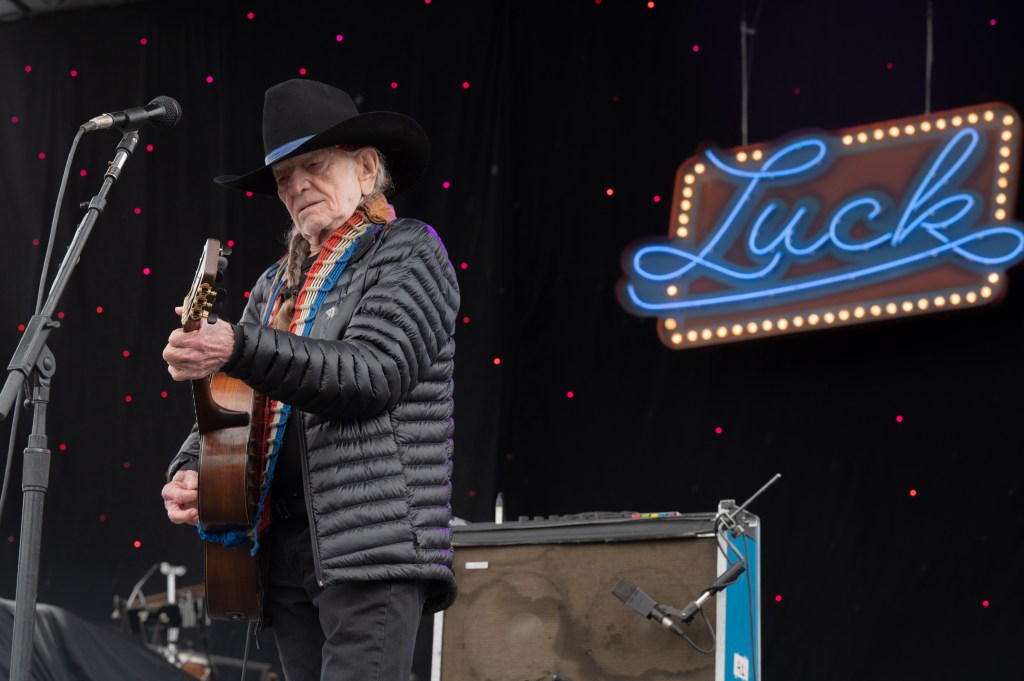  Singer, songwriter and guitarist Willie Nelson performs live on stage at the Luck Reunion on March 17, 2022 in Luck, Texas.