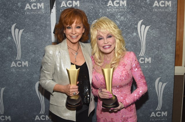 NASHVILLE, TN - AUGUST 23: Honorees Reba McEntire and Dolly Parton attend the 11th Annual ACM Honors at the Ryman Auditorium on August 23, 2017 in Nashville, Tennessee. 