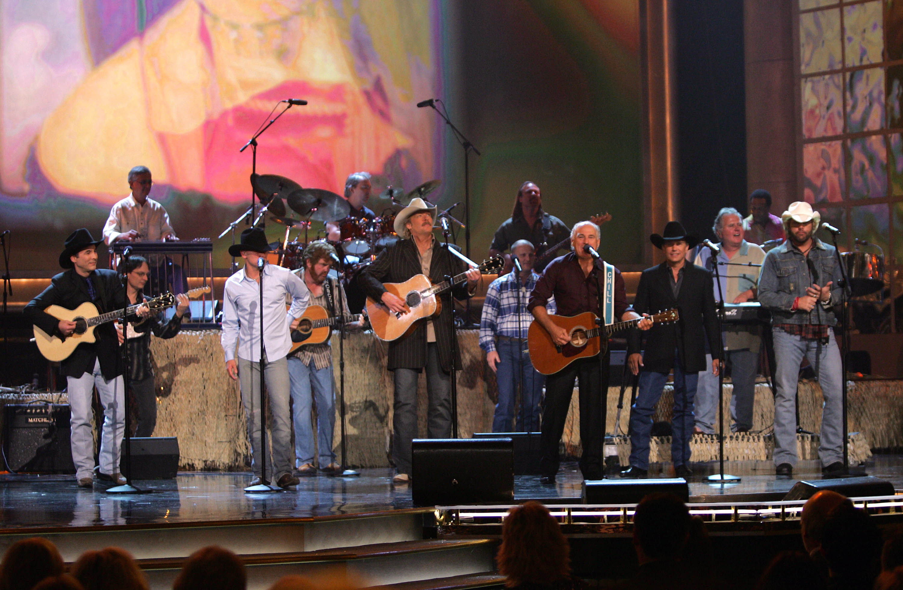 NASHVILLE, TN - NOVEMBER 9: (L-R) Clint Black, Kenny Chesney, Alan Jackson, Jimmy Buffett, George Strait and Toby Keith perform on stage at the 38th Annual CMA Awards at the Grand Ole Opry House November 9, 2004 in Nashville, Tennessee.