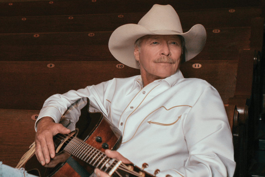 Alan Jackson poses with guitar
