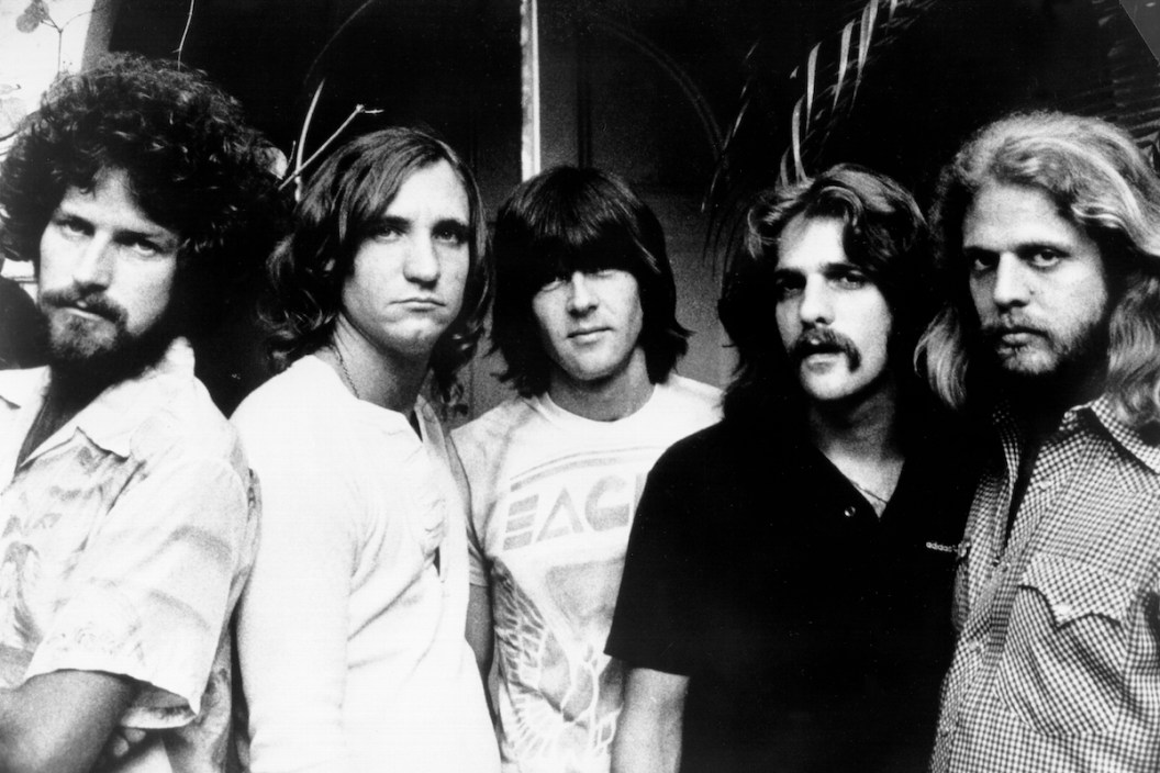 Don Henley, Joe Walsh, Randy Meisner, Glenn Frey and Don Felder of the rock band "Eagles" pose for a portrait in 1977.