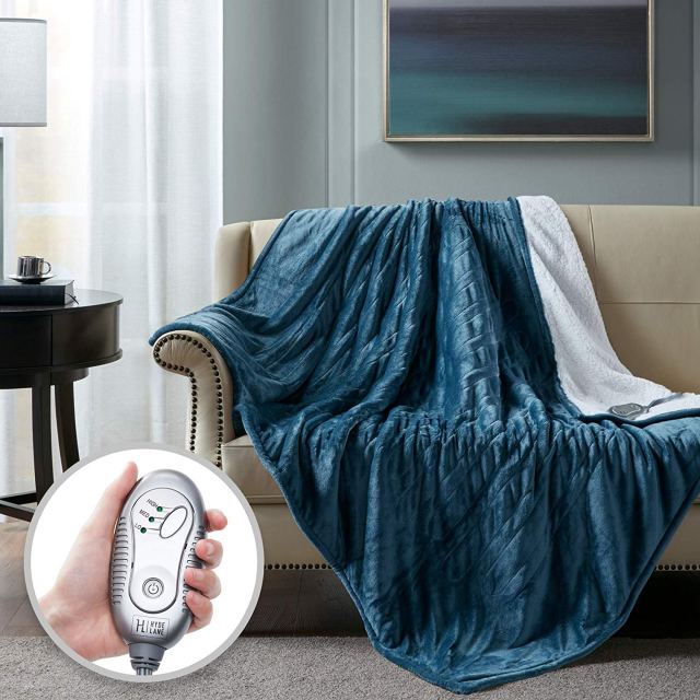 Hyde Lane best heated throw blanket in color blue draped over couch
