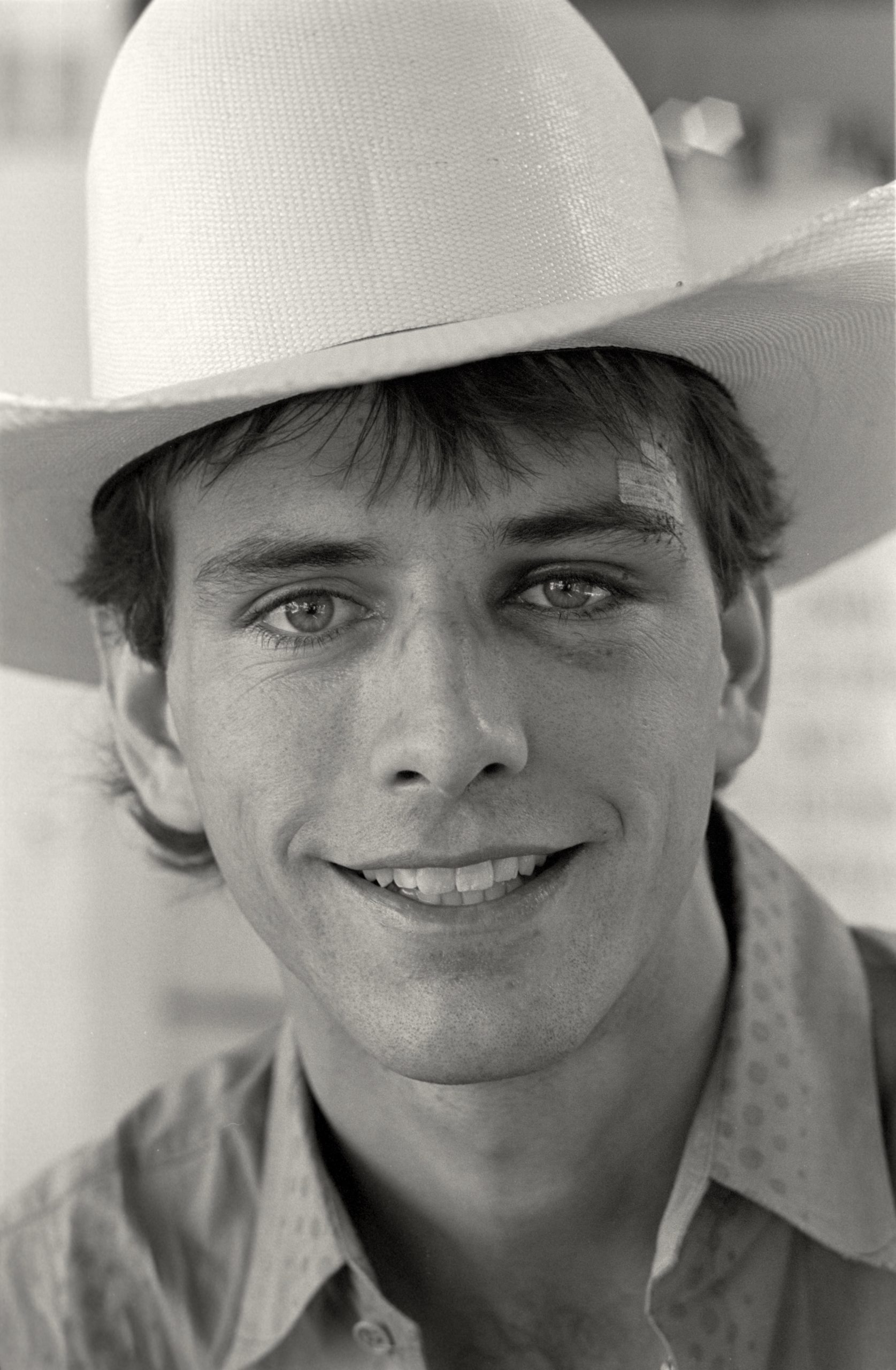 CHEYENNE, WY - JULY 1987: Professional rodeo bull rider Lane Frost headshot taken at the Cheyenne Frontier Days Arena during the Cheyenne Frontier Days rodeo on July 1987 in Cheyenne, Wyoming. (Photo by Mark Junge/Getty Images)