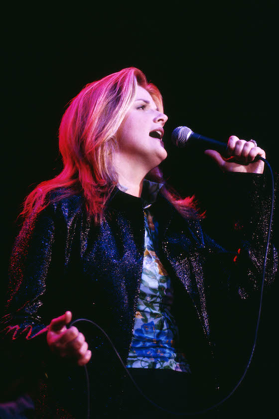 Photo of Trisha YEARWOOD; Trisha Yearwood performing on stage circa 1997