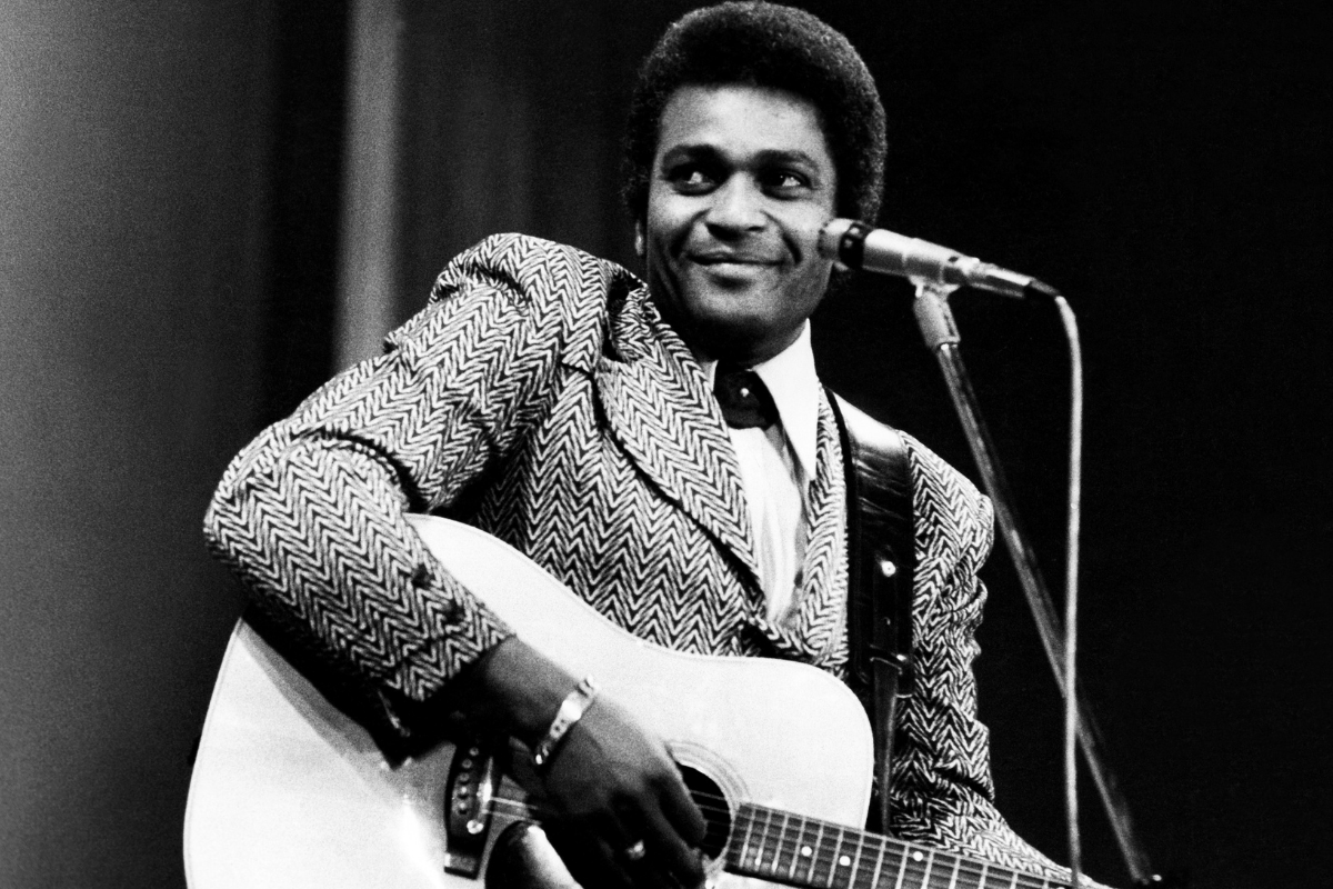 Charley Pride performs on a TV show, London, February 1975. (Photo by Michael Putland/Getty Images)