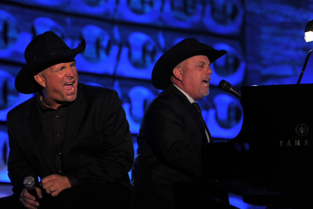 Garth Brooks and Billy Joel perform onstage at the Songwriters Hall of Fame 42nd Annual Induction and Awards at The New York Marriott Marquis Hotel - Shubert Alley on June 16, 2011 in New York City.