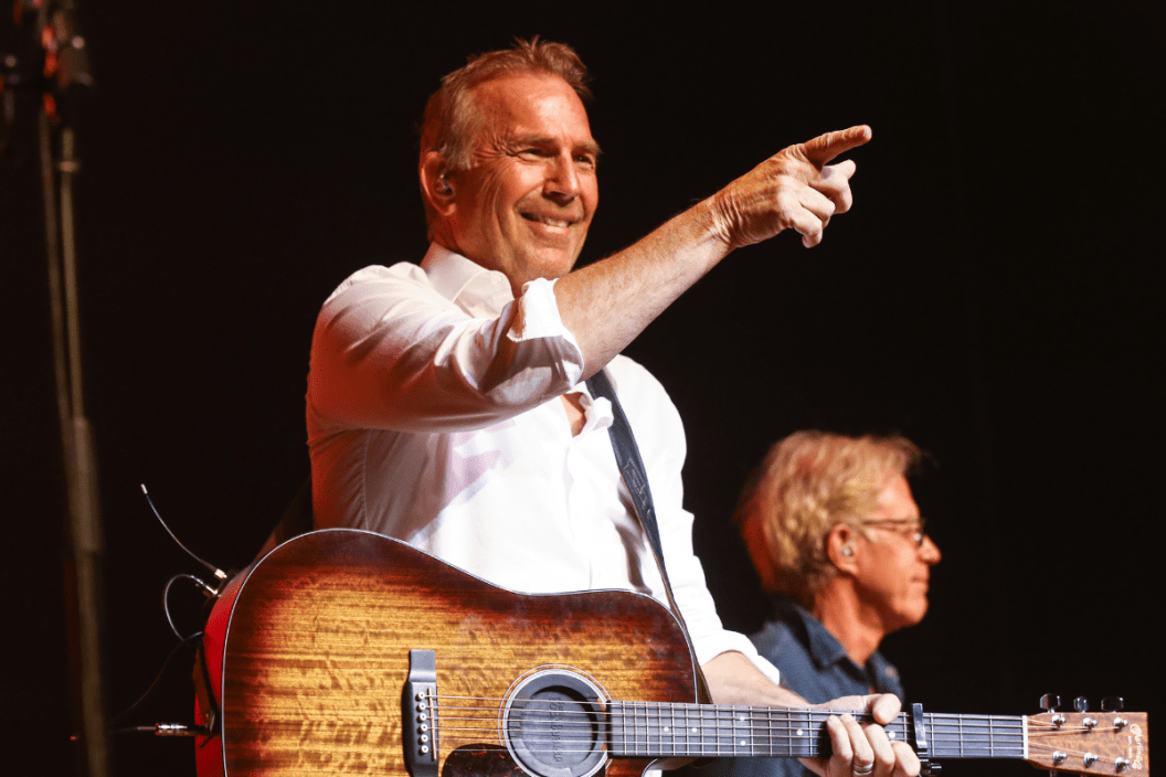 Kevin Costner performs with his band Modern West on stage at Ryman Auditorium on October 26, 2021 in Nashville, Tennessee.