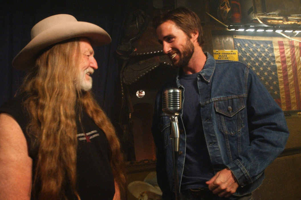 Willie Nelson and Luke Wilson during Willie Nelson on the Set of His Video for the Song "Maria/Shut-Up and Kiss Me" at Red Rock West Saloon in New York City, New York, United States.