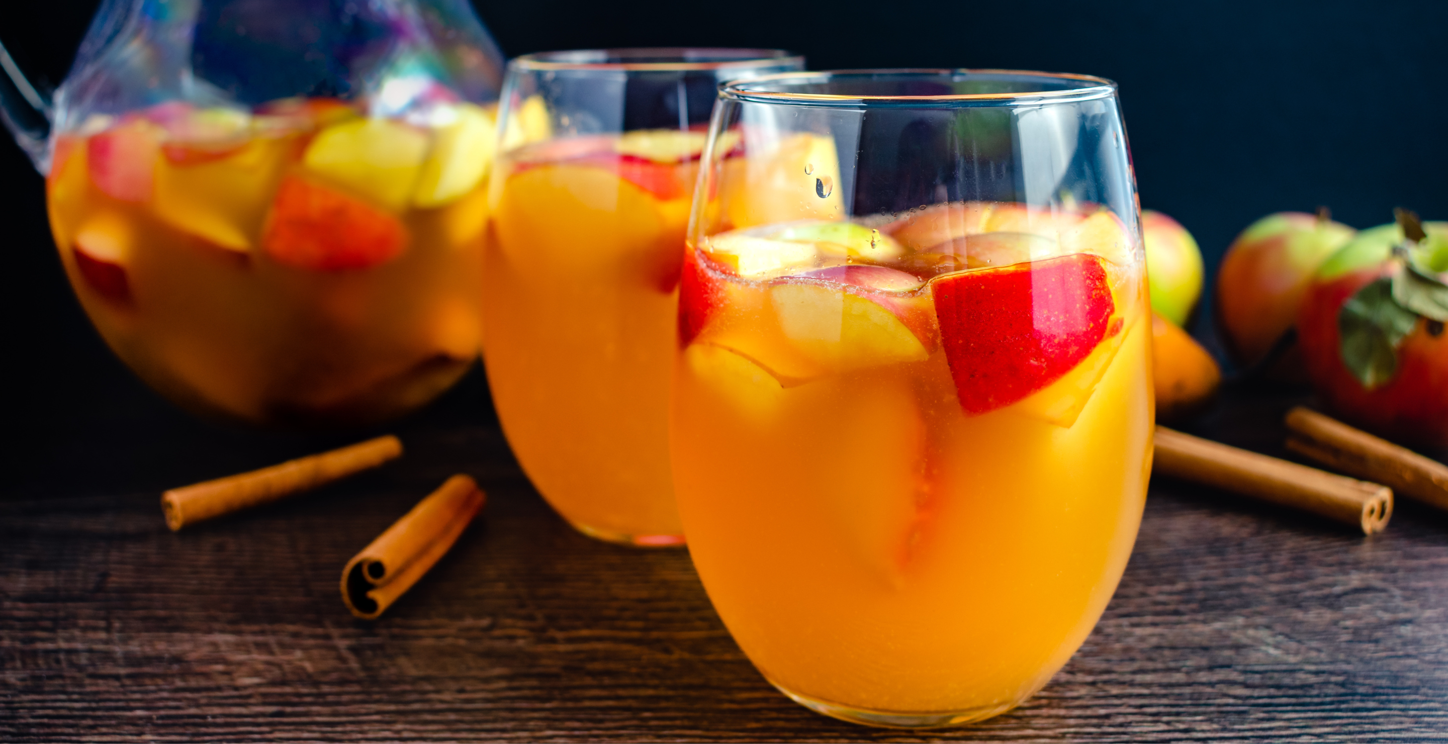 Fall sangria flavored with fruit, bourbon, and maple syrup