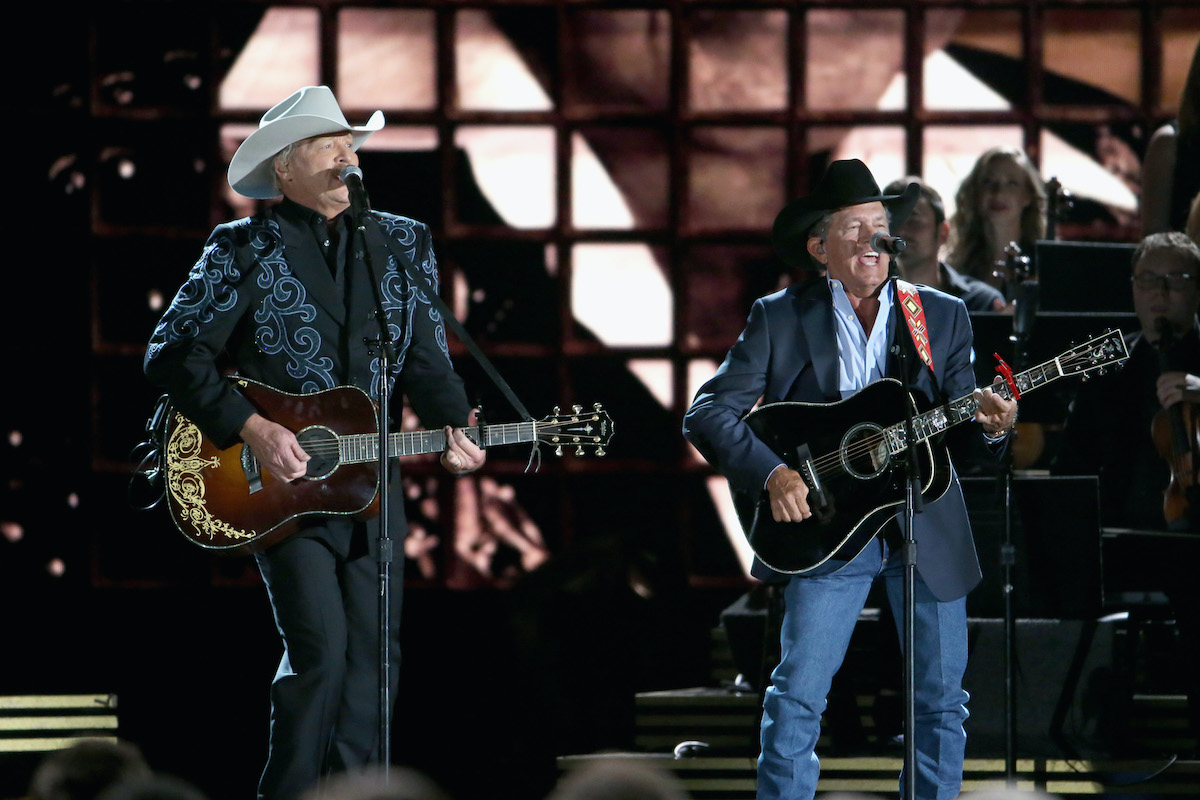 NASHVILLE, TN - NOVEMBER 02: Alan Jackson and George Strait perform onstage at the 50th annual CMA Awards at the Bridgestone Arena on November 2, 2016 in Nashville, Tennessee.