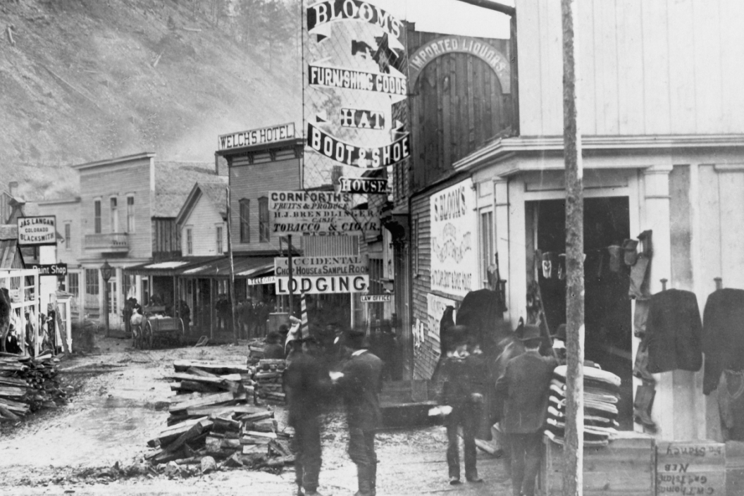 View of Deadwood, in South Dakota, in its heyday, as photographed by F.J. Haynes, showing store fronts and a group of men in Deadwood, South Dakota, USA, circa 1877. (Photo by Fotosearch/Getty Images).