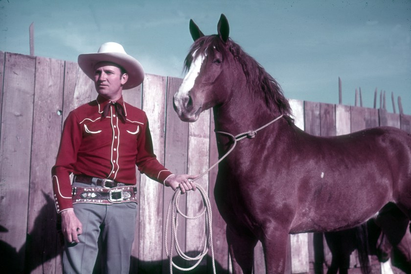 LOS ANGELES - CIRCA 1940: Gene Autry poses with his horse Champion circa 1940 in Los Angeles, California. 