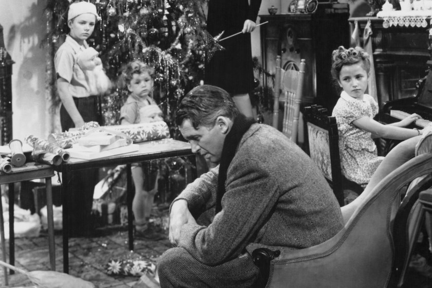American actors James Stewart (1908 - 1997) and Donna Reed (1921 - 1986) star in the film 'It's a Wonderful Life', 1946. The children are Larry Simms (Peter Bailey), Jimmy Hawkins (Tommy Bailey) and Carol Coombs (Janie Bailey).