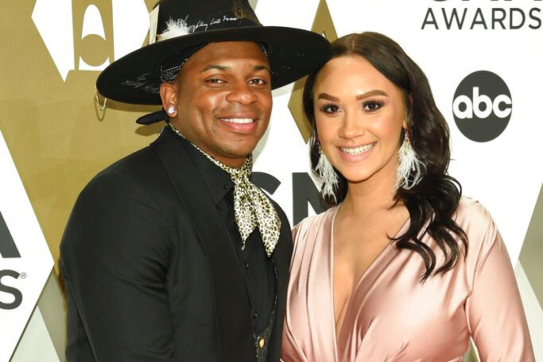 jimmie allen and alexis gale post on the red carpet