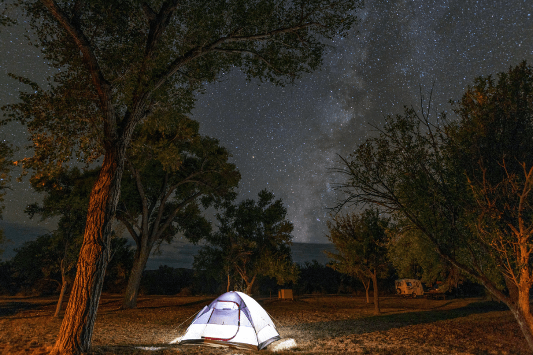 An illuminated tent at night on a campground in Big Bend National Park, USA