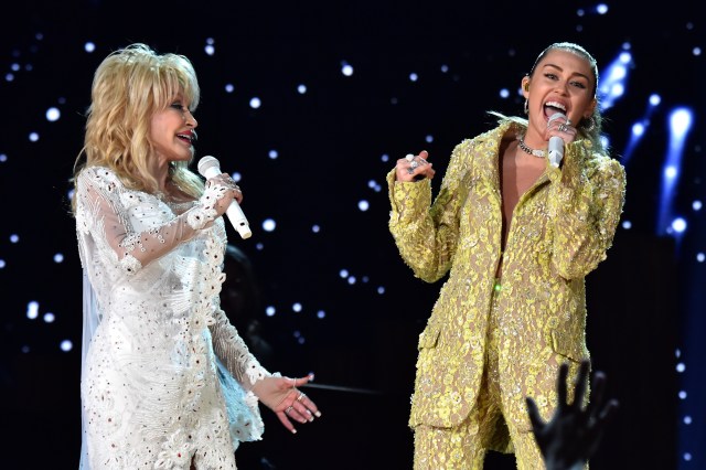 Dolly Parton (L) and Miley Cyrus perform onstage during the 61st Annual GRAMMY Awards at Staples Center on February 10, 2019 in Los Angeles, California.