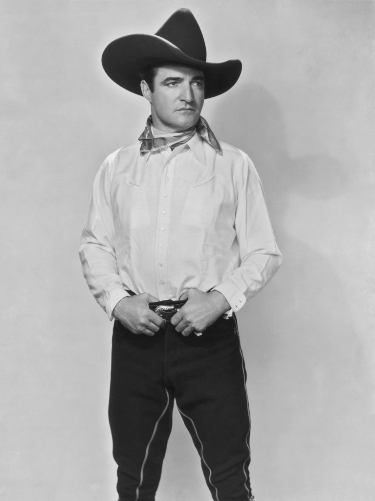 Publicity still of American actor Tom Mix (1880 - 1940) for the 1932 film 'The Fourth Horseman. 