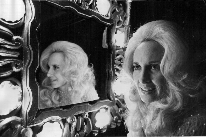 MINNEAPOLIS, MN. - MARCH 1975: Country music singer, songwriter, performer Tammy Wynette at the dressing room mirror aboard her bus before a show at the Guthrie Theater in Minneapolis, Minn., Saturday, March 22, 1975.Minneapolis Tribune photo. 