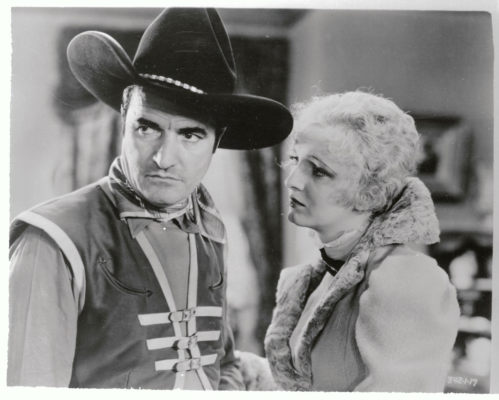 Here Tom Mix, (real name Hezikiah Mix), one of the idolized heroes of the American films, is shown in an old western scene.