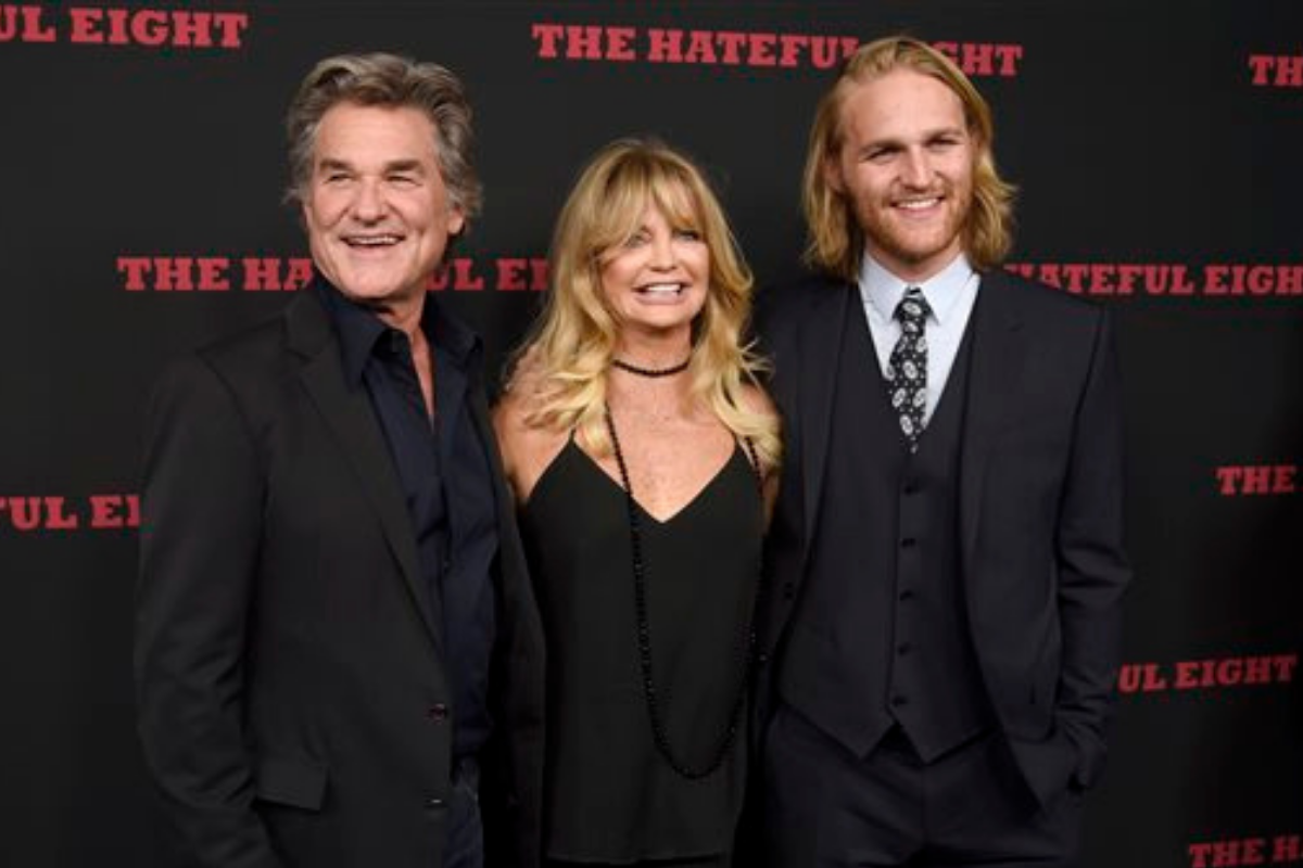 Kurt Russell, Goldie Hawn, and Wyatt Russell pose on the red carpet
