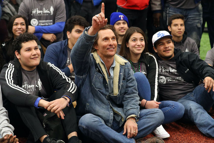 ARLINGTON, TEXAS - MARCH 05: Matthew McConaughey poses for a group photo with students from three just keep livin foundation program high schools at Texas Rangers MLB Youth Academy at Mercy Street Sports Complex on March 05, 2019 in Arlington, Texas. 