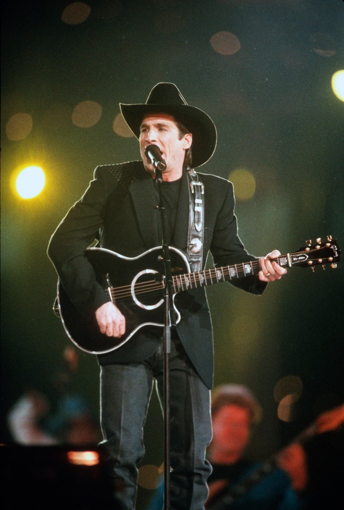 ATLANTA, GA - JANUARY 30:  Clint Black preforms during the halftime show of Super Bowl XXVIII between the Dallas Cowboys and Buffalo Bills on January 30, 1994 at the Georgia Dome in Atlanta, Georgia. The Cowboys won the Super Bowl 30 -13. 