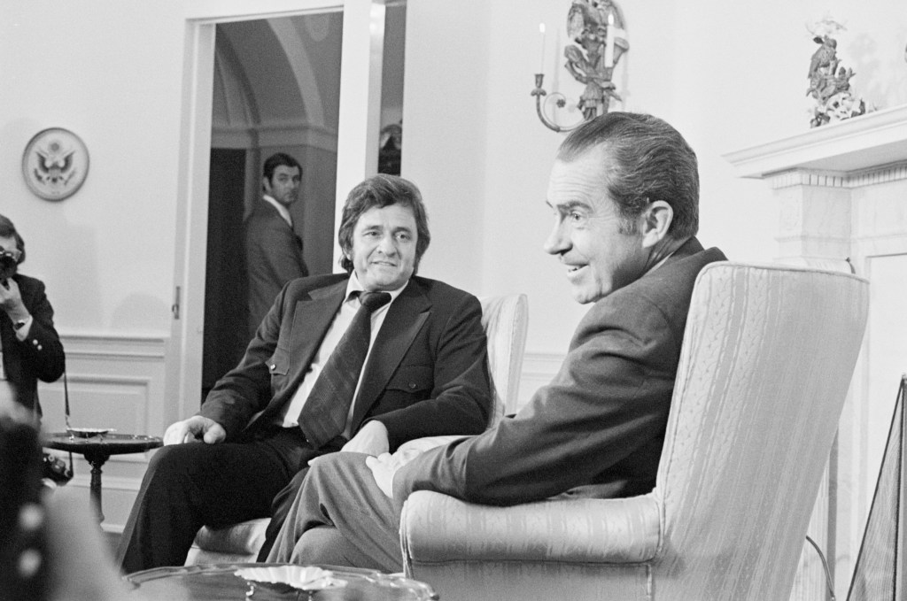 Singer Johnny Cash, who has given shows in prisons across the nation, appears before a Senate subcommittee on national penitentiaries which is conducting hearings on a federal prison reorganization act. Following his appearance Cash paid a visit to President Nixon at the White House to discuss the testimony.
