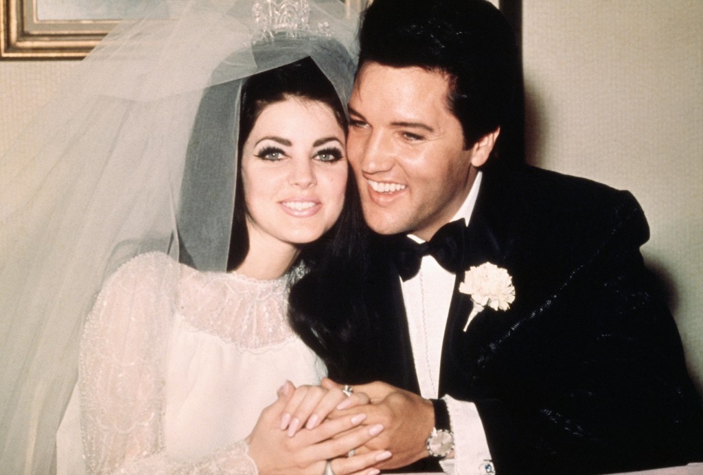 Las Vegas, Nev..Entertainer, Elvis Presley sits cheek to cheek wit his bride, the former Priscilla Ann Beaulieu, following their wedding May 1, 1967.