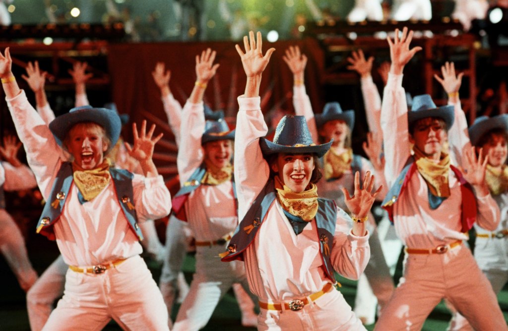 A chorus group of dancers performs during the half-time show at the 1994 Atlanta, Georgia, Superbowl XXVII football game at the Georgia Dome. 