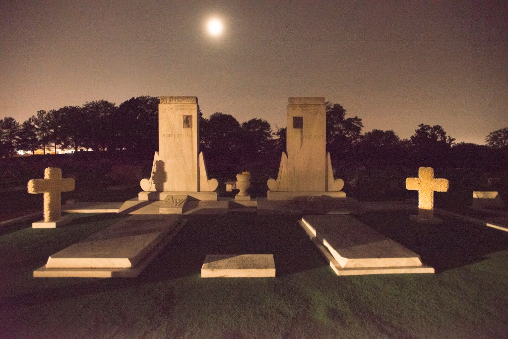 Nighttime view of the grave of singer Hank Williams at the Oakwood Cemetery Annex in Montgomery, Alabama, January 18, 2014.