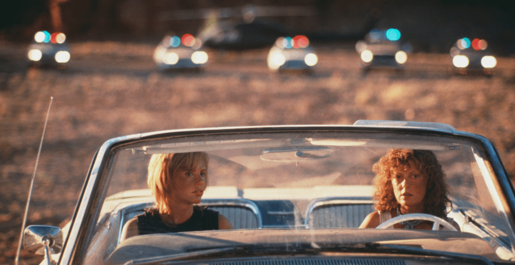 Actresses Geena Davis (left) and Susan Sarandon weigh up their options in the film 'Thelma And Louise', 1991