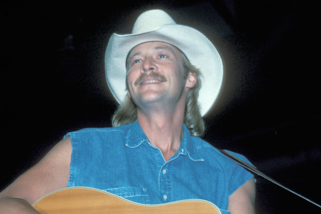 Country music star Alan Jackson is shown performing on stage during a "live" concert appearance on May 21, 1993.