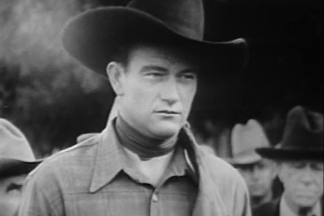 John Wayne singing cowboy