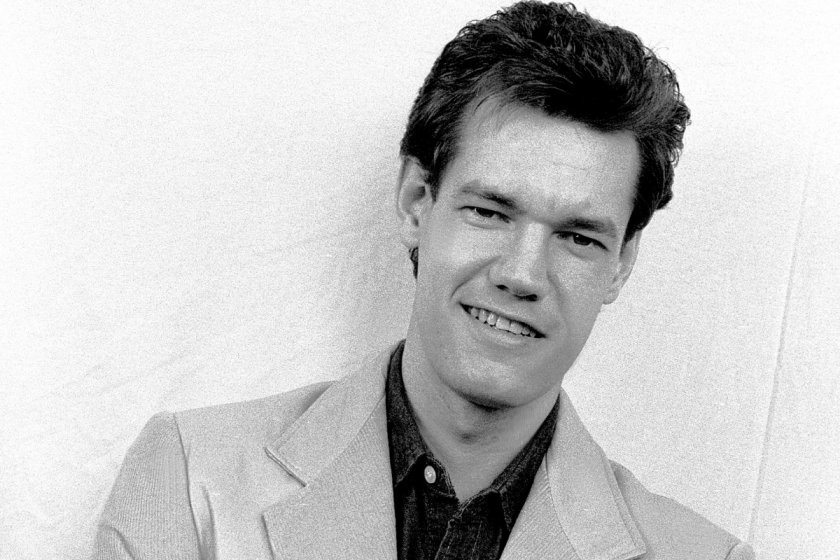 Country musician Randy Travis as he poses backstage at an unspecified nightclub, Dallas, Texas, December 13, 1986.
