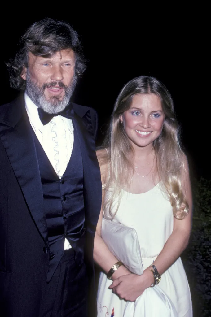 BEVERLY HILLS, CA - MARCH 26: Kris Kristofferson and daughter Tracy Kristofferson attend the birthday party for Diana Ross on March 26, 1982 in Beverly Hills, California. 