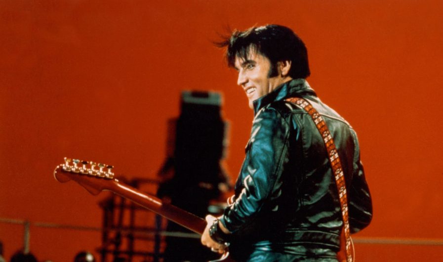BURBANK, CA - JUNE 27: Rock and roll musician Elvis Presley performing on the Elvis comeback TV special on June 27, 1968.