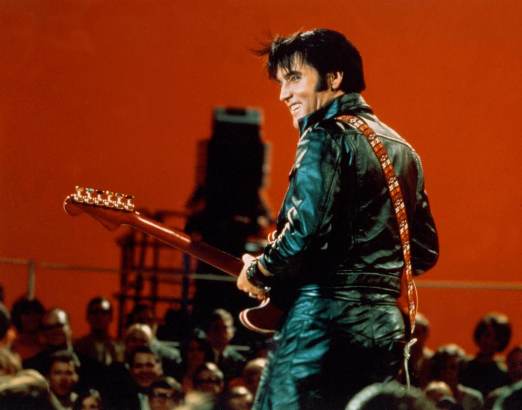 BURBANK, CA - JUNE 27:  Rock and roll musician Elvis Presley performing on the Elvis comeback TV special on June 27, 1968. 