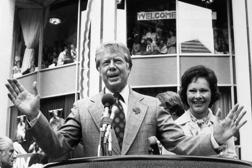 Jimmy Carter and his wife, Rosalynn, who is ready to claim the Democratic Presidential nomination at his party's national convention next week, gets a hero's welcome outside his hotel following his arrival.