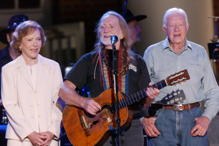 Musician Willie Nelson (C) is joined by former First Lady Rosalynn Carter and former President Jimmy Carter at the taping of "CMT Homecoming: Jimmy Carter in Plains," which will premiere on CMT in December 2004.