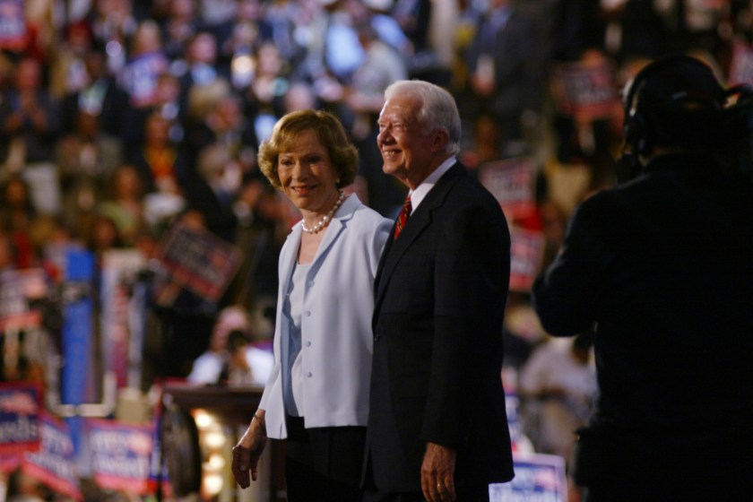 BOSTON, MA - JULY 26: Former President Jimmy Carter and his wife, Rosalynn Carter, wave to delegates at the Democratic National Convention at the FleetCenter in Boston on July 26, 2004.