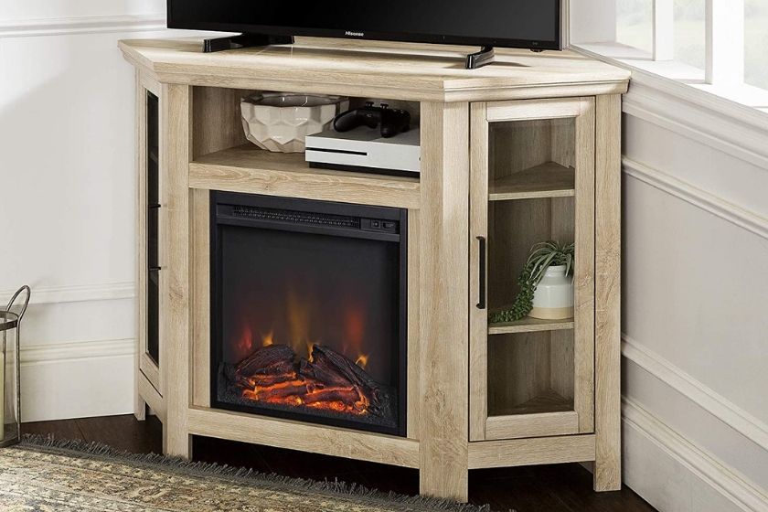 tan corner electric fireplace with tv on top