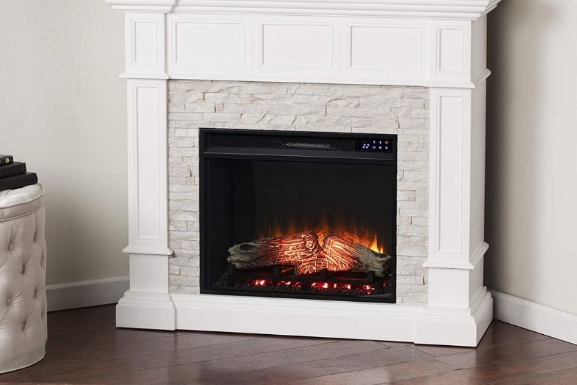 white corner electric fireplace with fire going