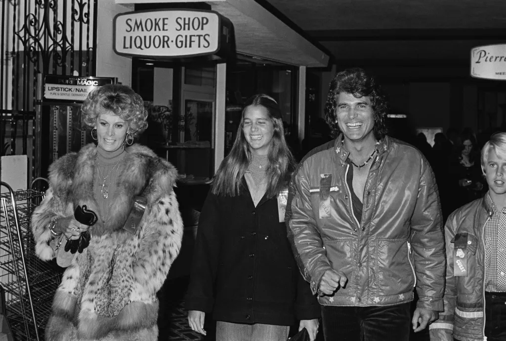 American actor Michael Landon (1936-1991) with his wife, Marjorie Lynn Landon, and their children, Leslie Landon and Michael Landon Jr, attend the 45th annual Hollywood Santa Claus Lane Parade on Hollywood Boulevard in Los Angeles, California, 28th November 1976. 
