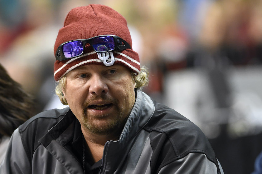 LAS VEGAS, NV - DECEMBER 20: Recording artist Toby Keith attends a game between the Oklahoma Sooners and the Washington Huskies during the 2014 MGM Grand Showcase basketball event at the MGM Grand Garden Arena on December 20, 2014 in Las Vegas, Nevada. Washington won 69-67. 