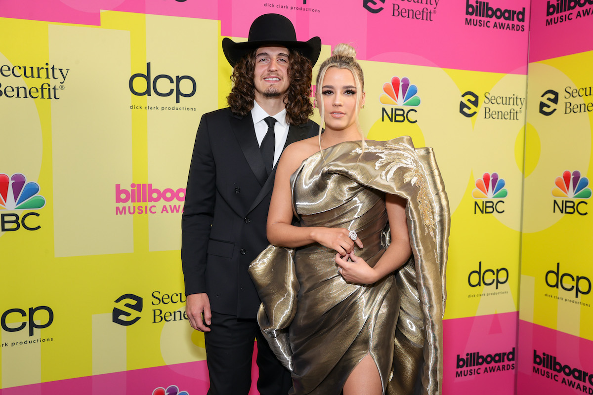 (L-R) Cade Foehner and Gabby Barrett pose backstage for the 2021 Billboard Music Awards, broadcast on May 23, 2021 at Microsoft Theater in Los Angeles, California.