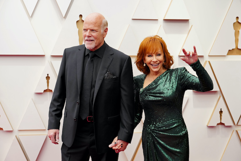 HOLLYWOOD, CALIFORNIA - MARCH 27: (L-R) Rex Linn and Reba McEntire attends the 94th Annual Academy Awards at Hollywood and Highland on March 27, 2022 in Hollywood, California. 